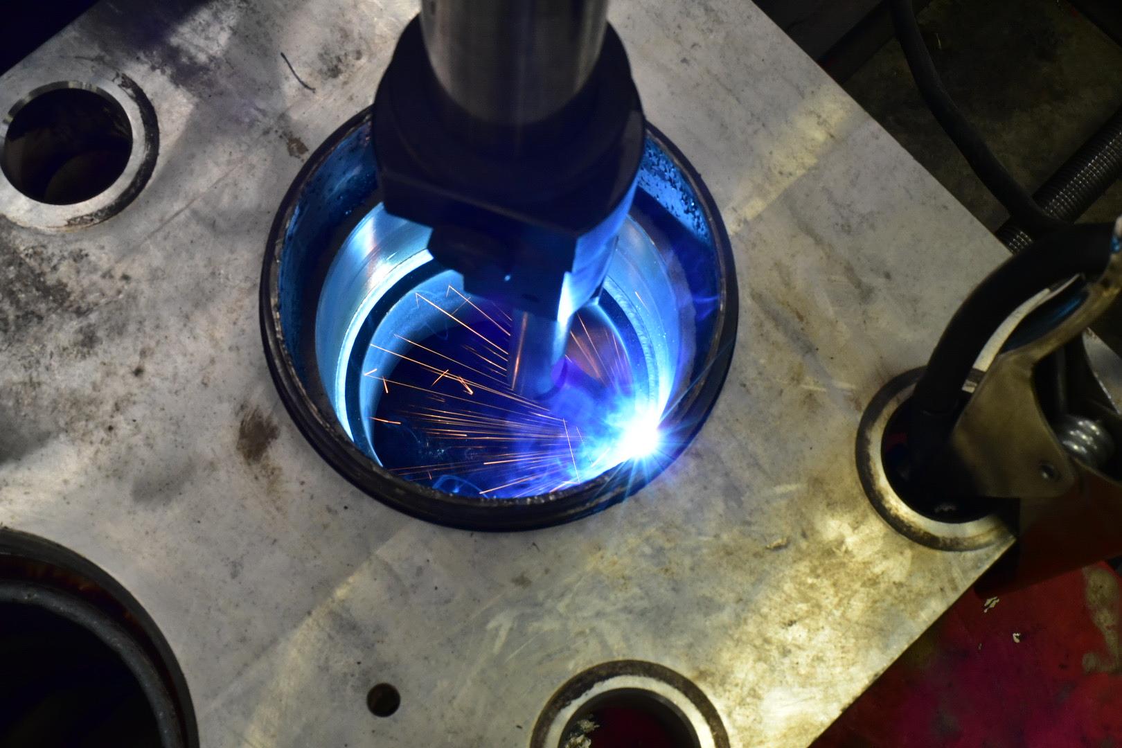 Rebuilding -Welding up Fluid End -Frac.JPG
