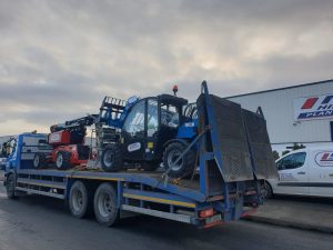 Small Genie Teleporter And Manitou Boom Heading To A Rental Job