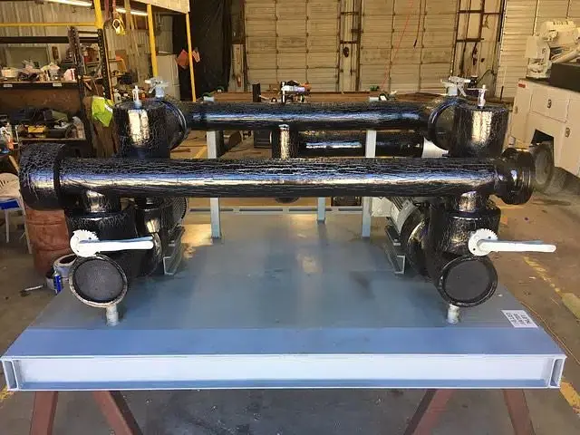 Custom pumping skid, headers and framing