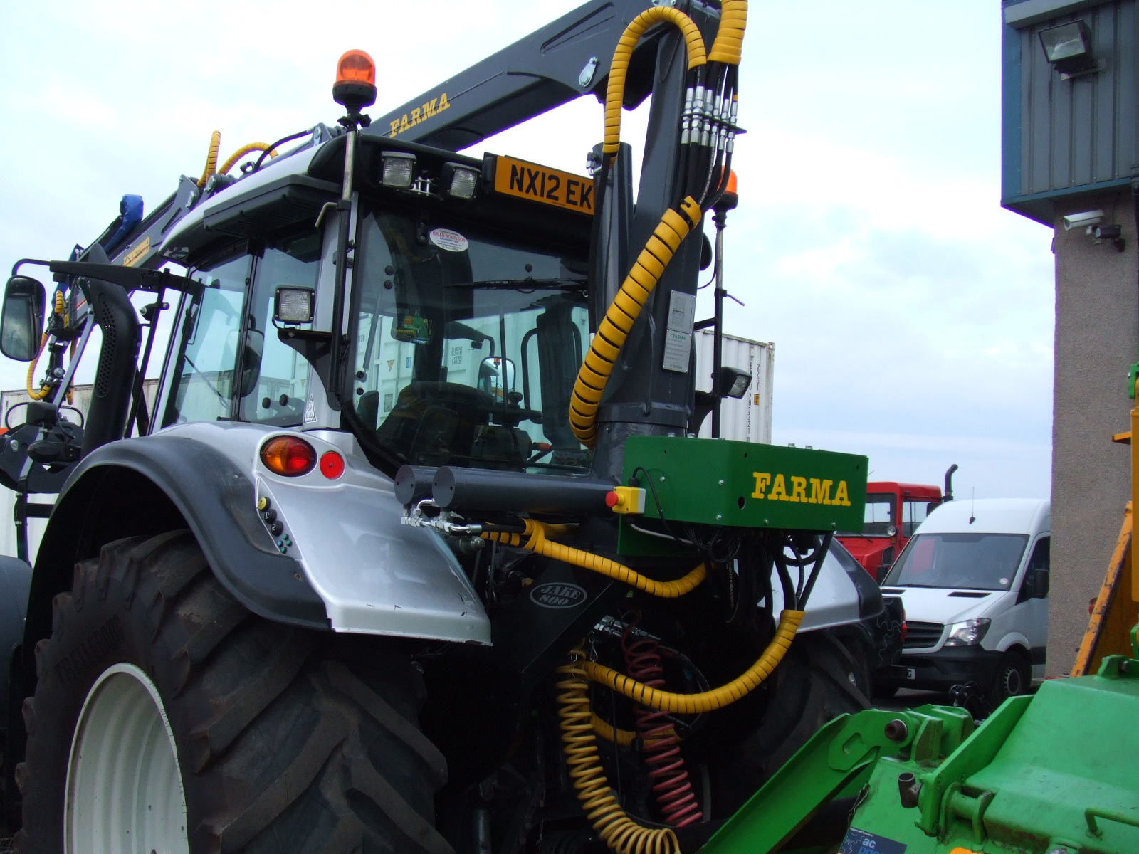 50KM/HR VALTRA WITH JAKE CRANE AND HEIZOHACK CHIPPER SET-UP