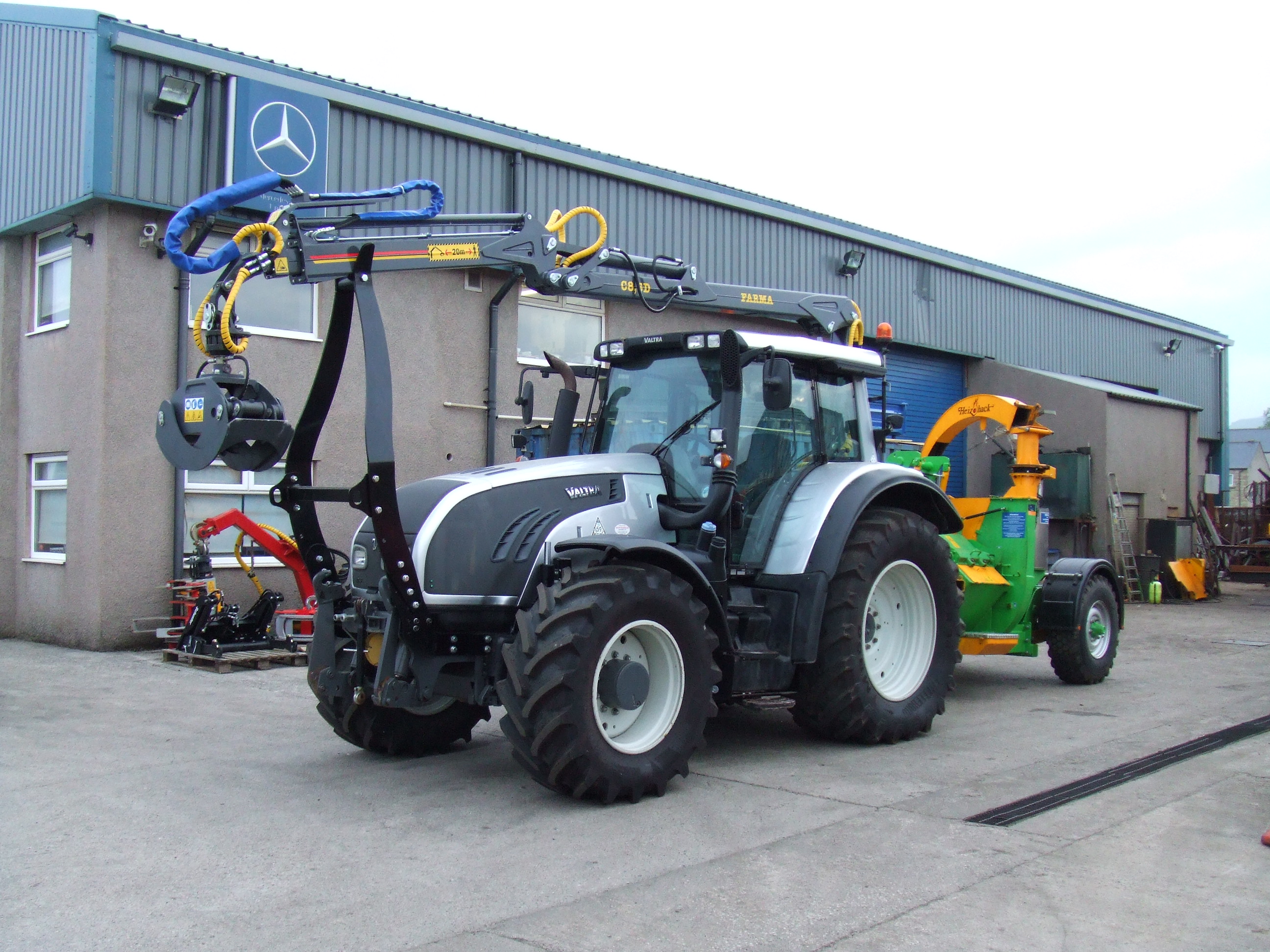 50KM/HR VALTRA WITH JAKE CRANE AND HEIZOHACK CHIPPER SET-UP