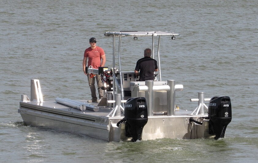 SolidCraft water taxi boarding passengers at dock