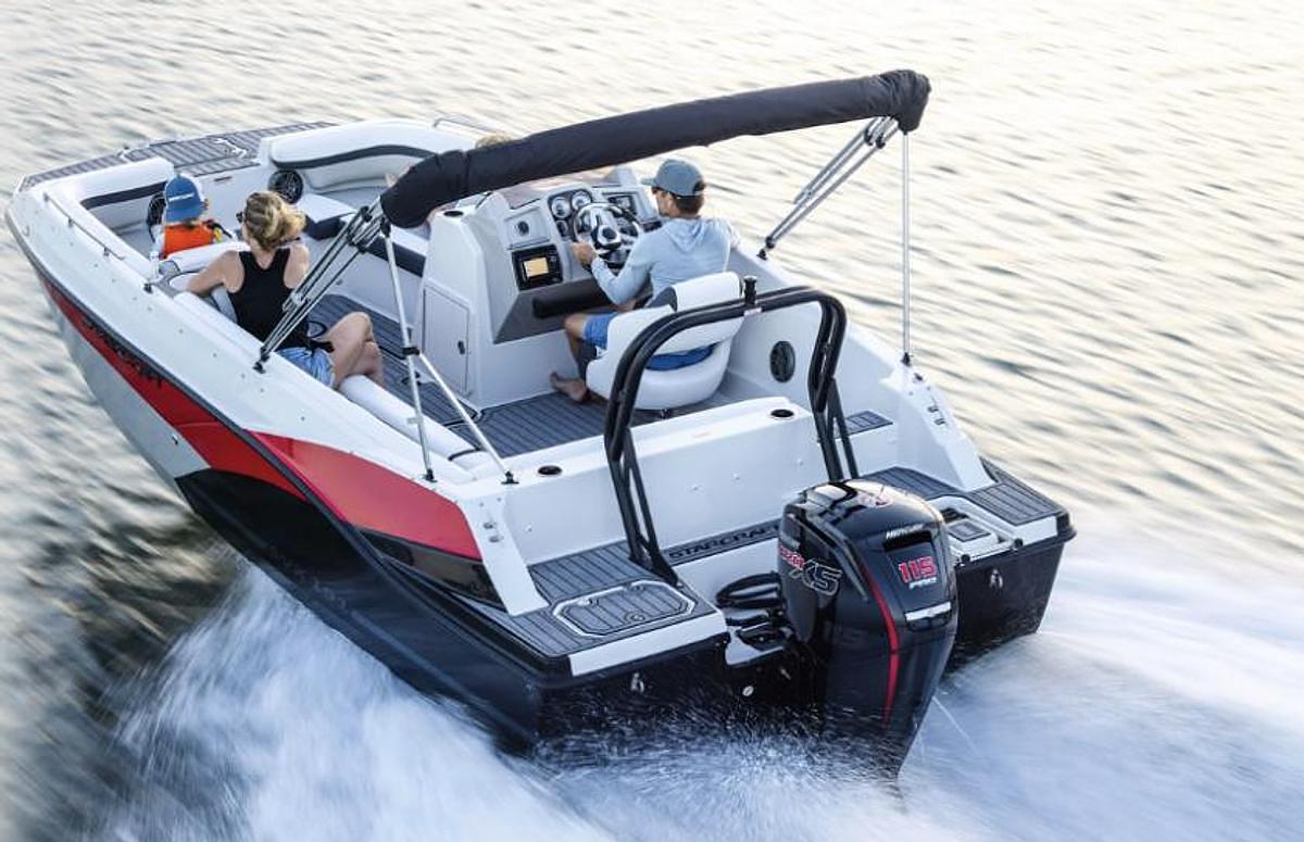 Starcraft deck boat with passengers
