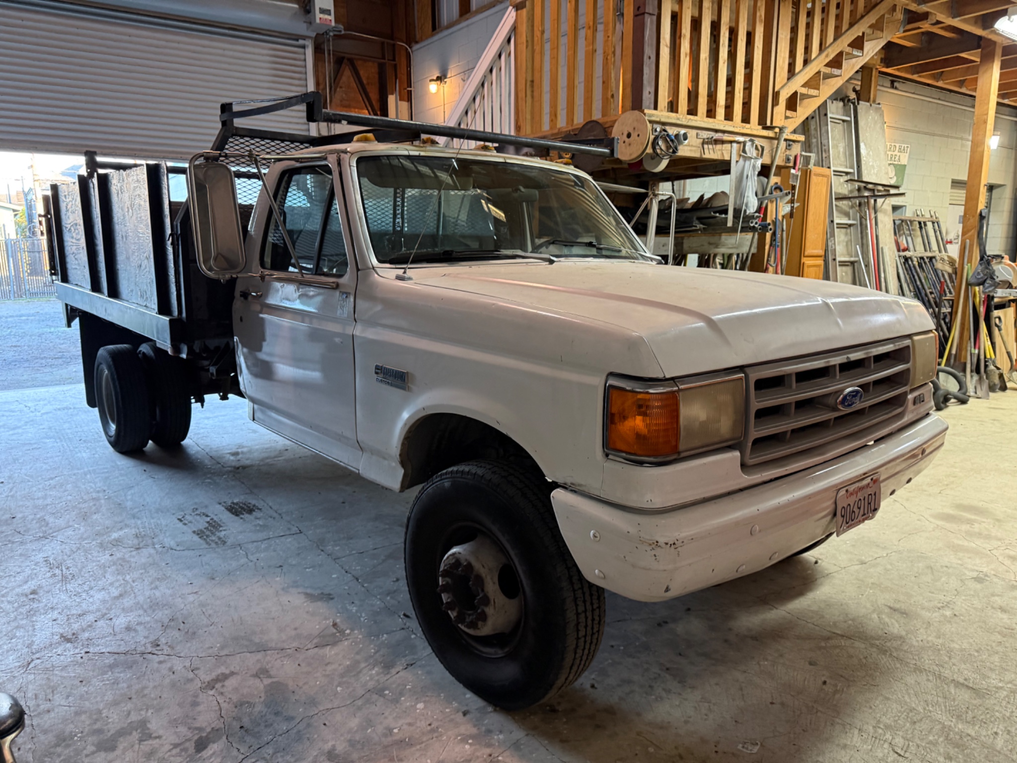 Construction Equipment, Dump Trucks, Drill Equipment, Cement Equipment, and Large Quantity of Power Tools