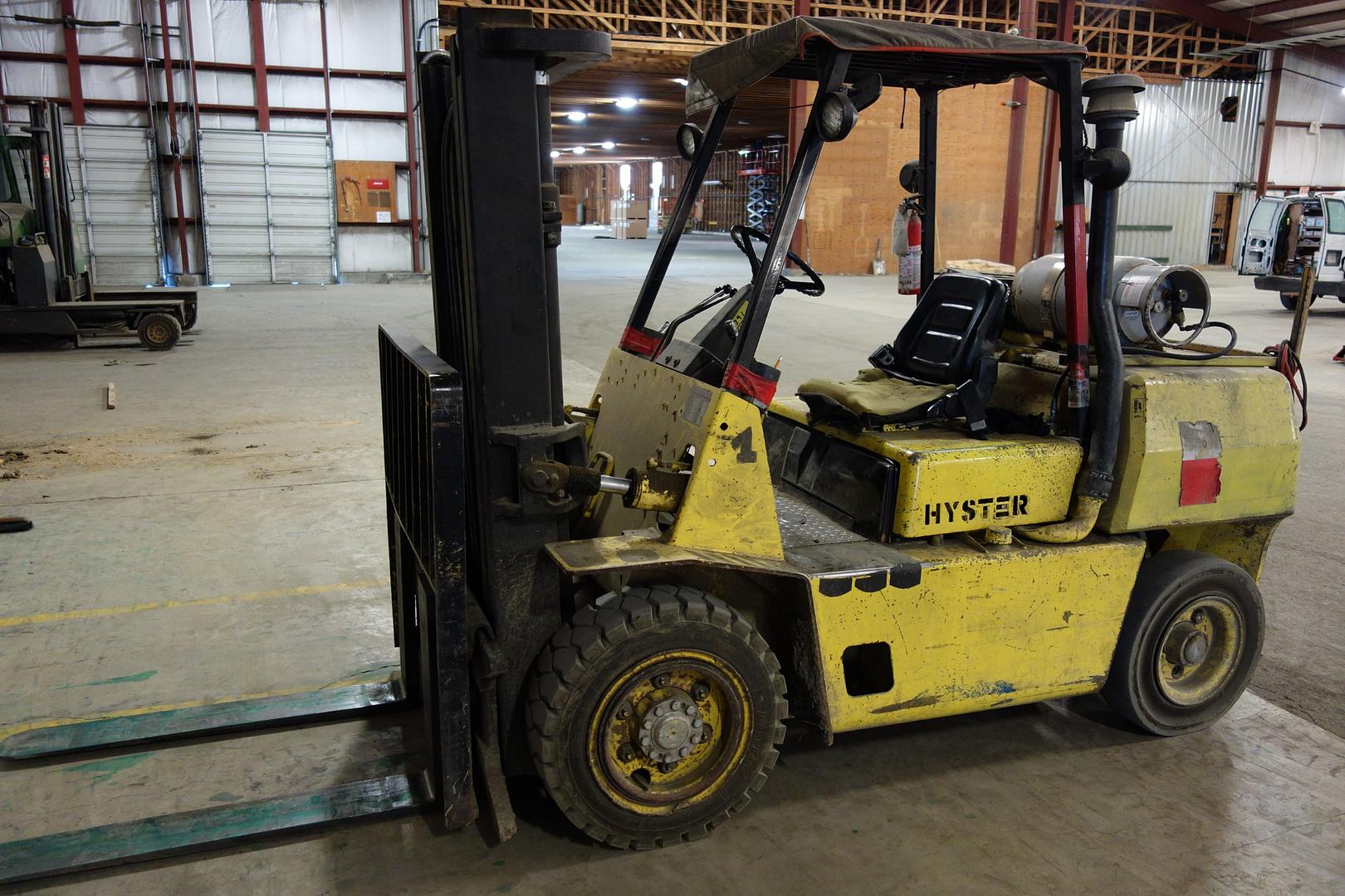 Past Auction- Former Assets of Log Home Builder