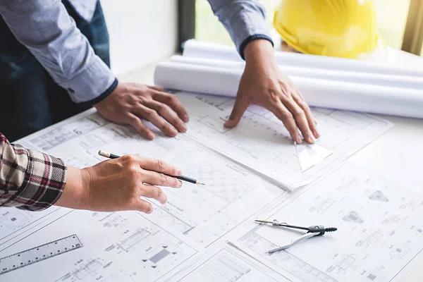 depositphotos_228697356-stock-photo-construction-engineering-or-architect-discuss.jpg