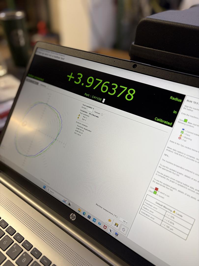 Laptop screen showing real time ball bar test results