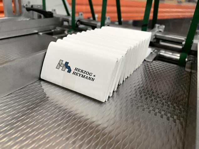 SPECIALISED FOLDING TECHNOLOGY FOR PHARMACEUTICAL LEAFLETS: H+H KL112.1 INSTALLED AT OPATISK
