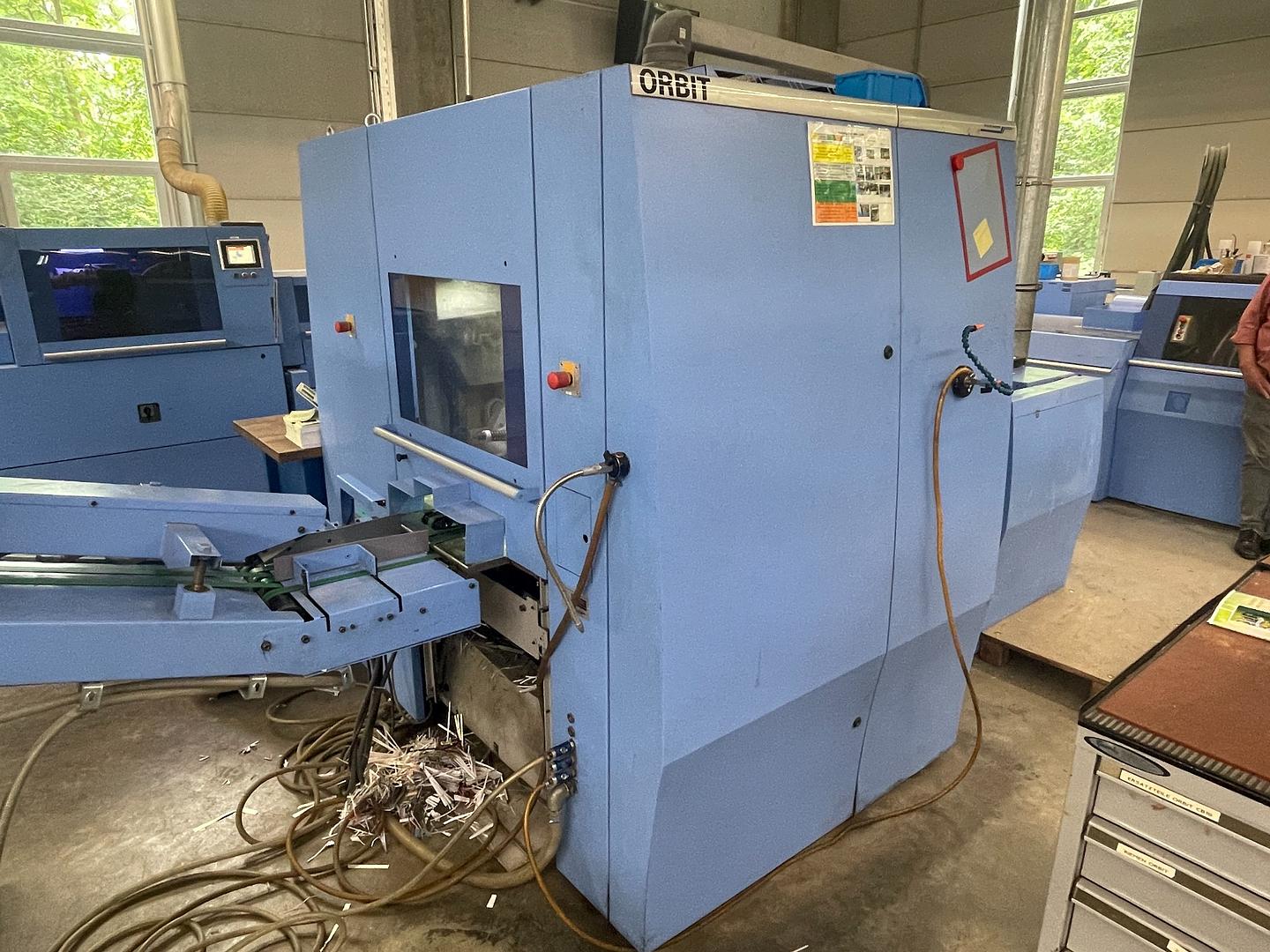 2009 - Muller Martini Orbit (3675) three knife trimmer