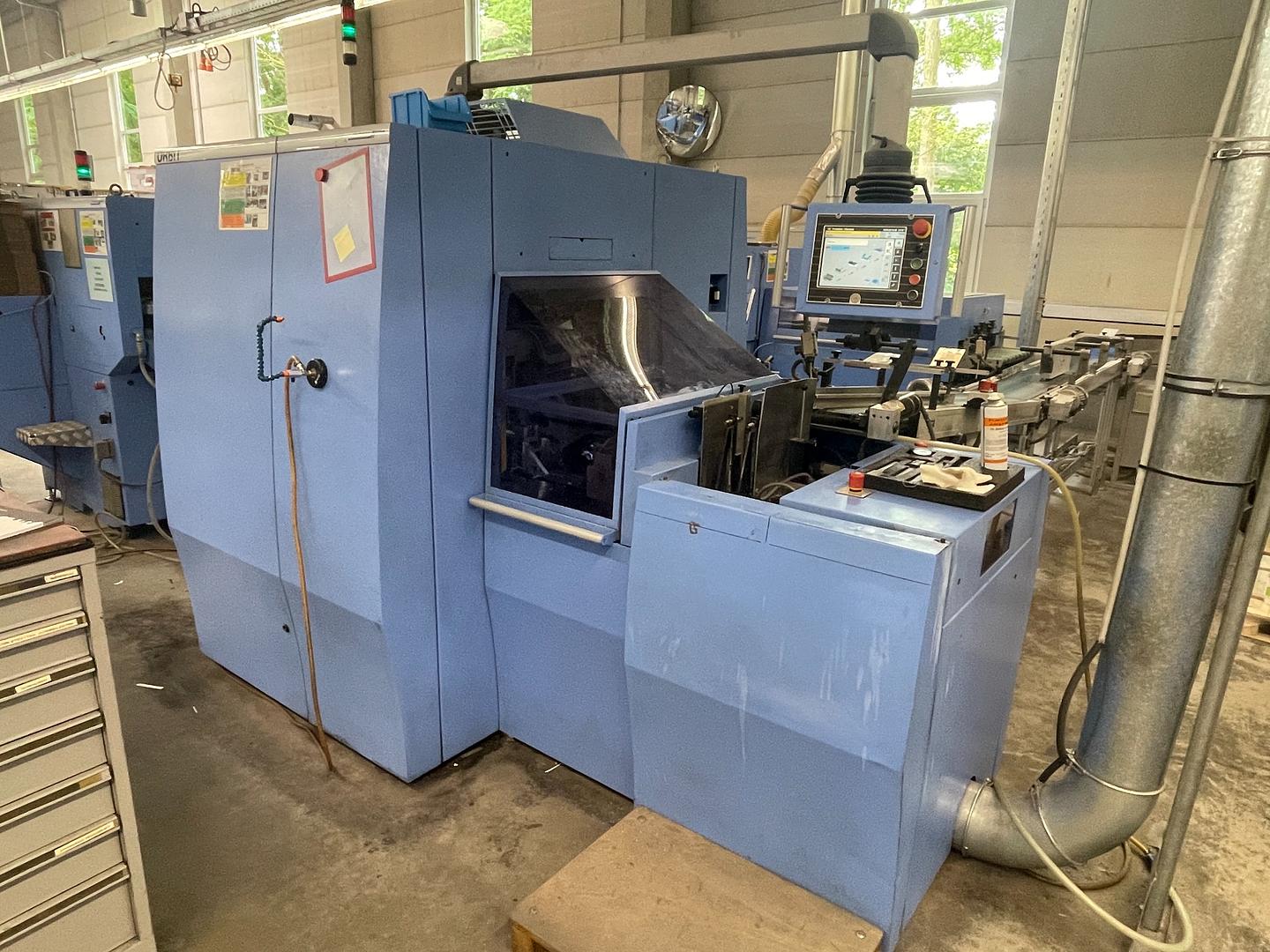 2009 - Muller Martini Orbit (3675) three knife trimmer