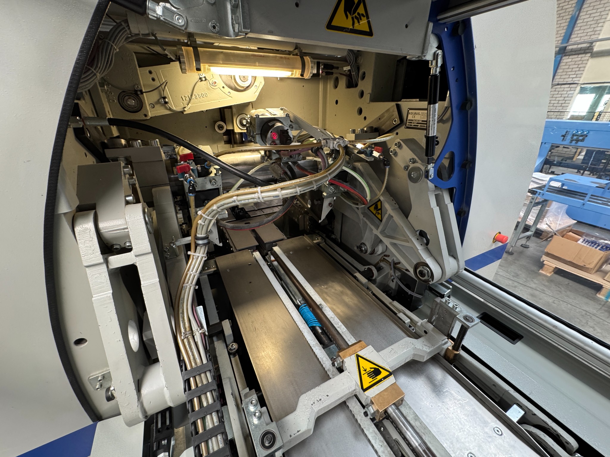 2010 - Kolbus HD 143.P Three knive timmer