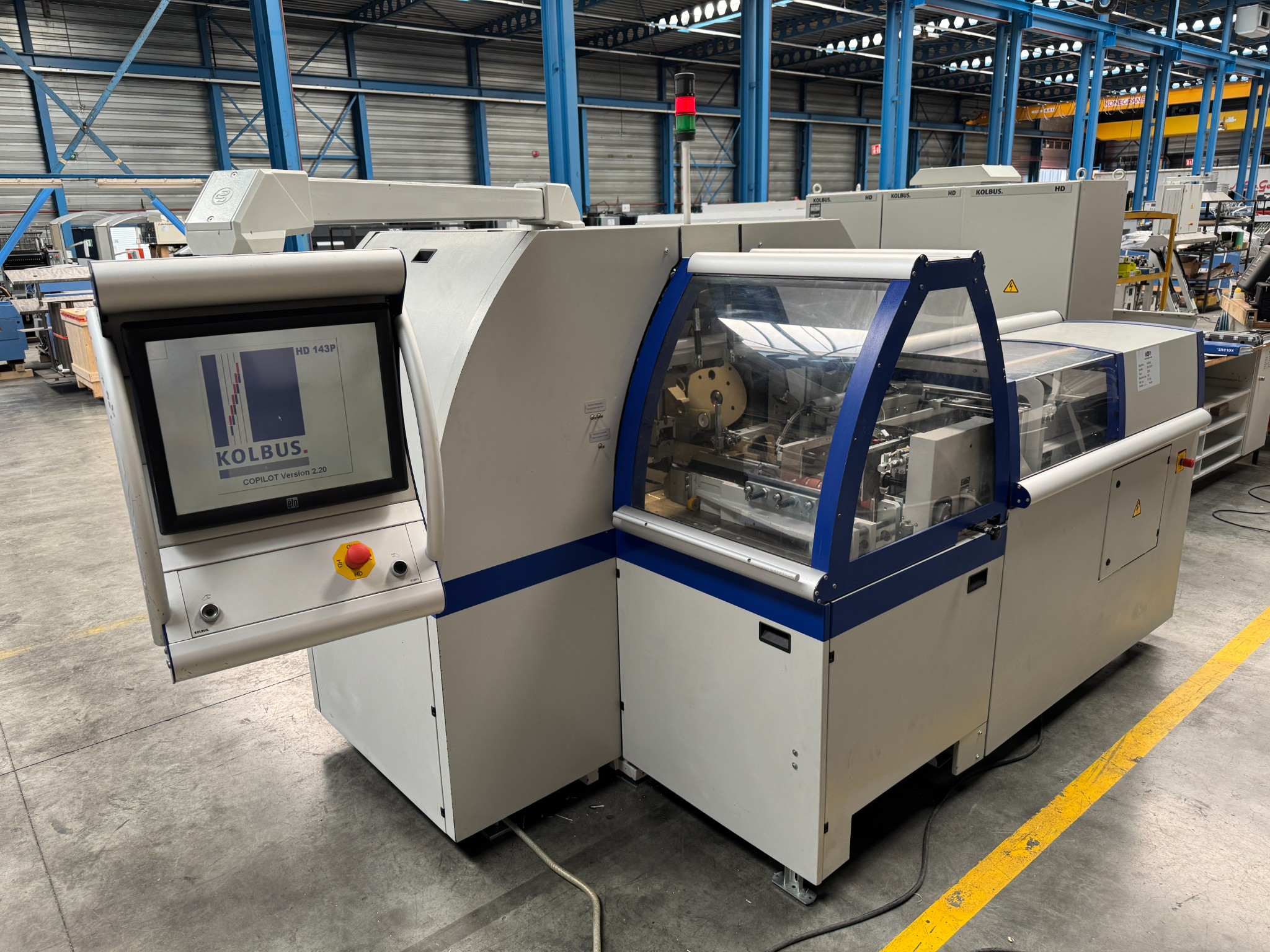 2010 - Kolbus HD 143.P Three knive timmer