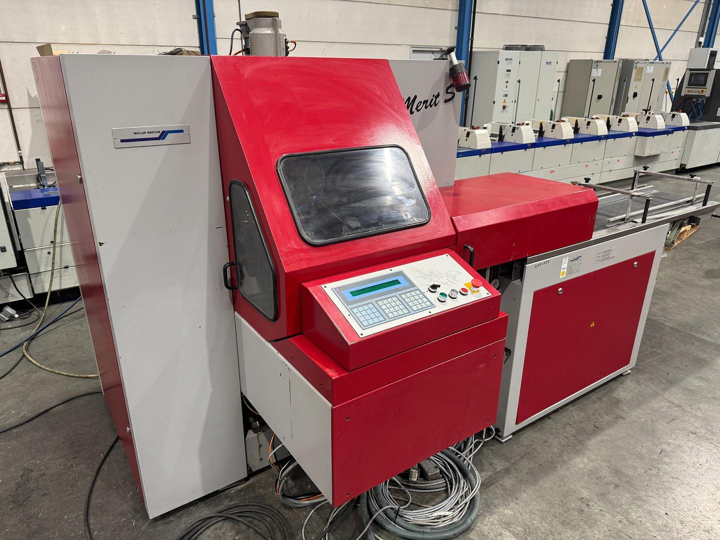 2007 - Muller Martini Acoro A7 perfect binder with inline gatherer and three knife trimmer