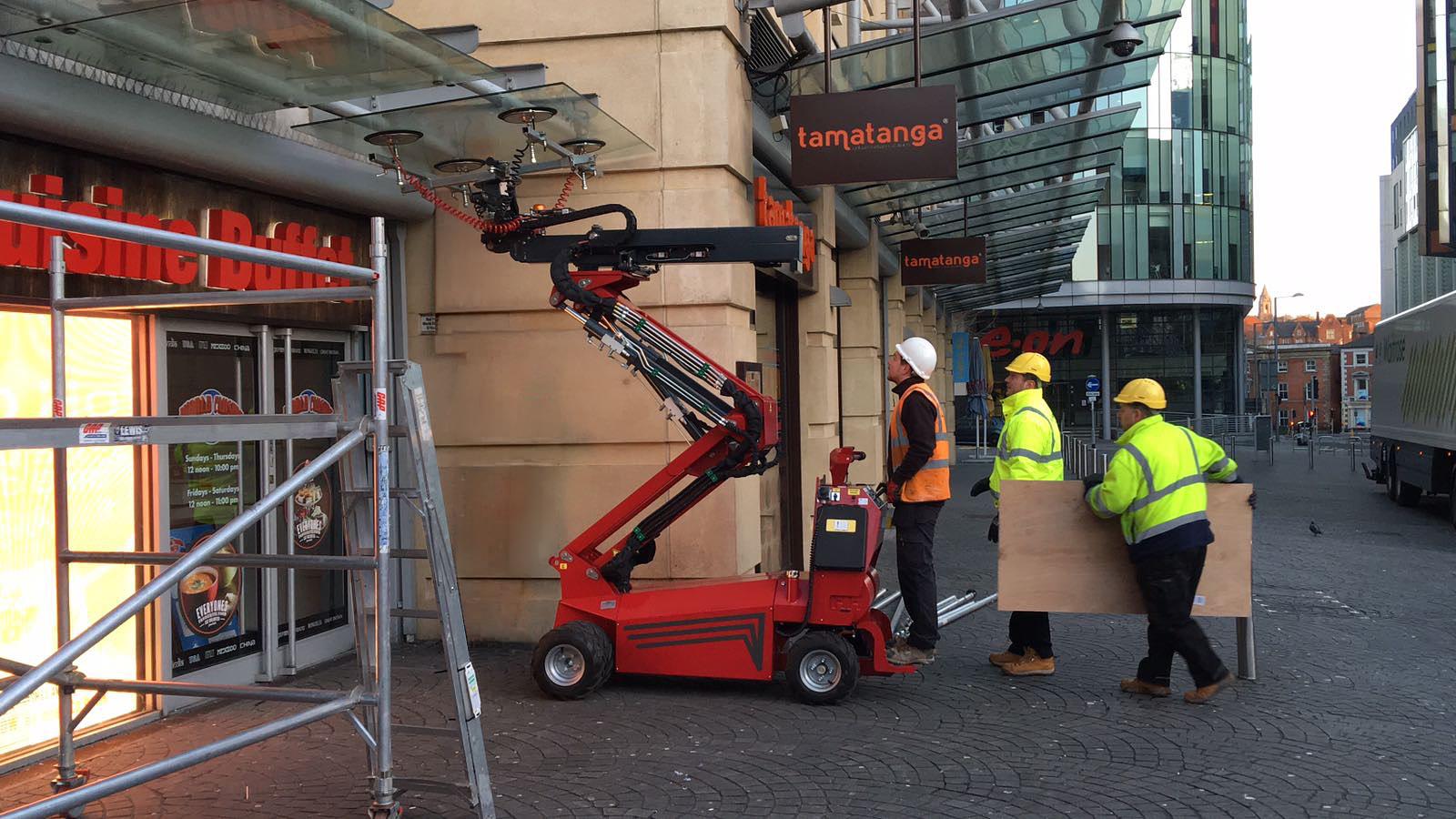Glazing in Tight Spaces: Why Canopy and Confined-Site Jobs Need a Glazing Robot, Not a Crane