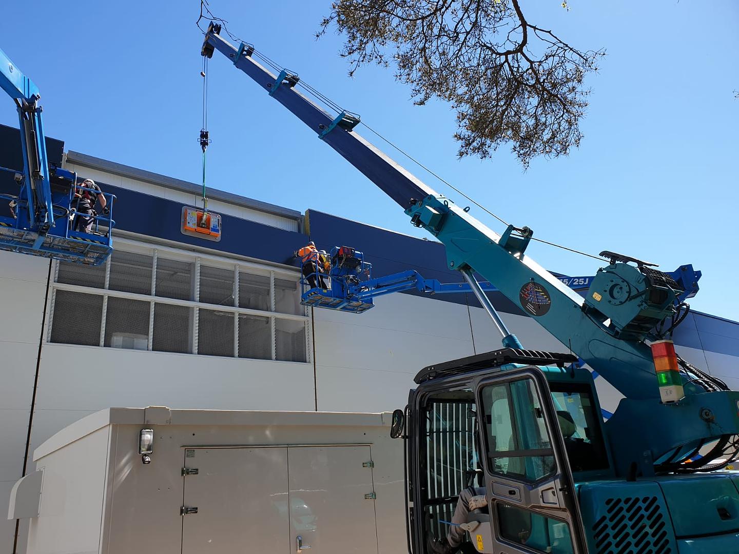 Installing Roofing Panels Safely with Cladding Lifters on Steel Frame Structures