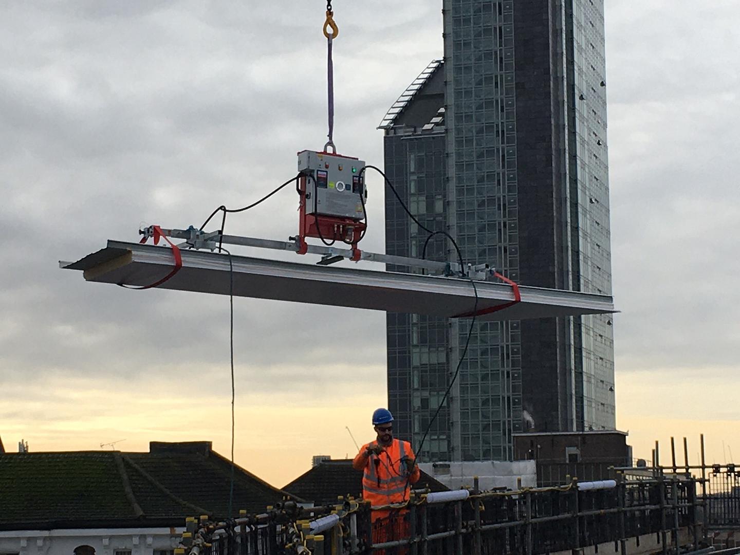 Installing Roofing Panels Safely with Cladding Lifters on Steel Frame Structures