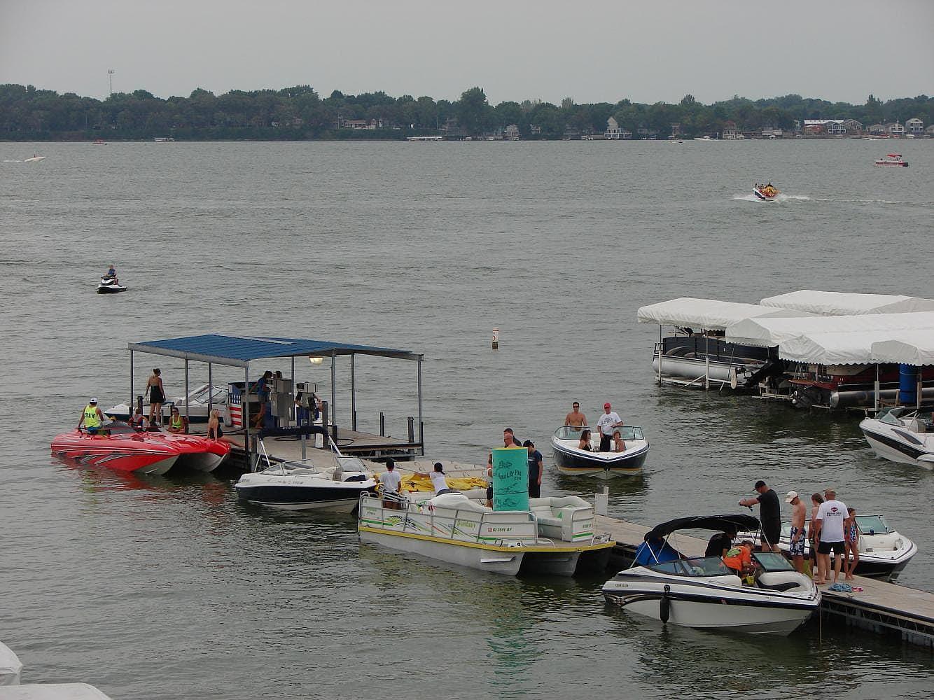 Clear Lake Boats gas dock with boats lined up
