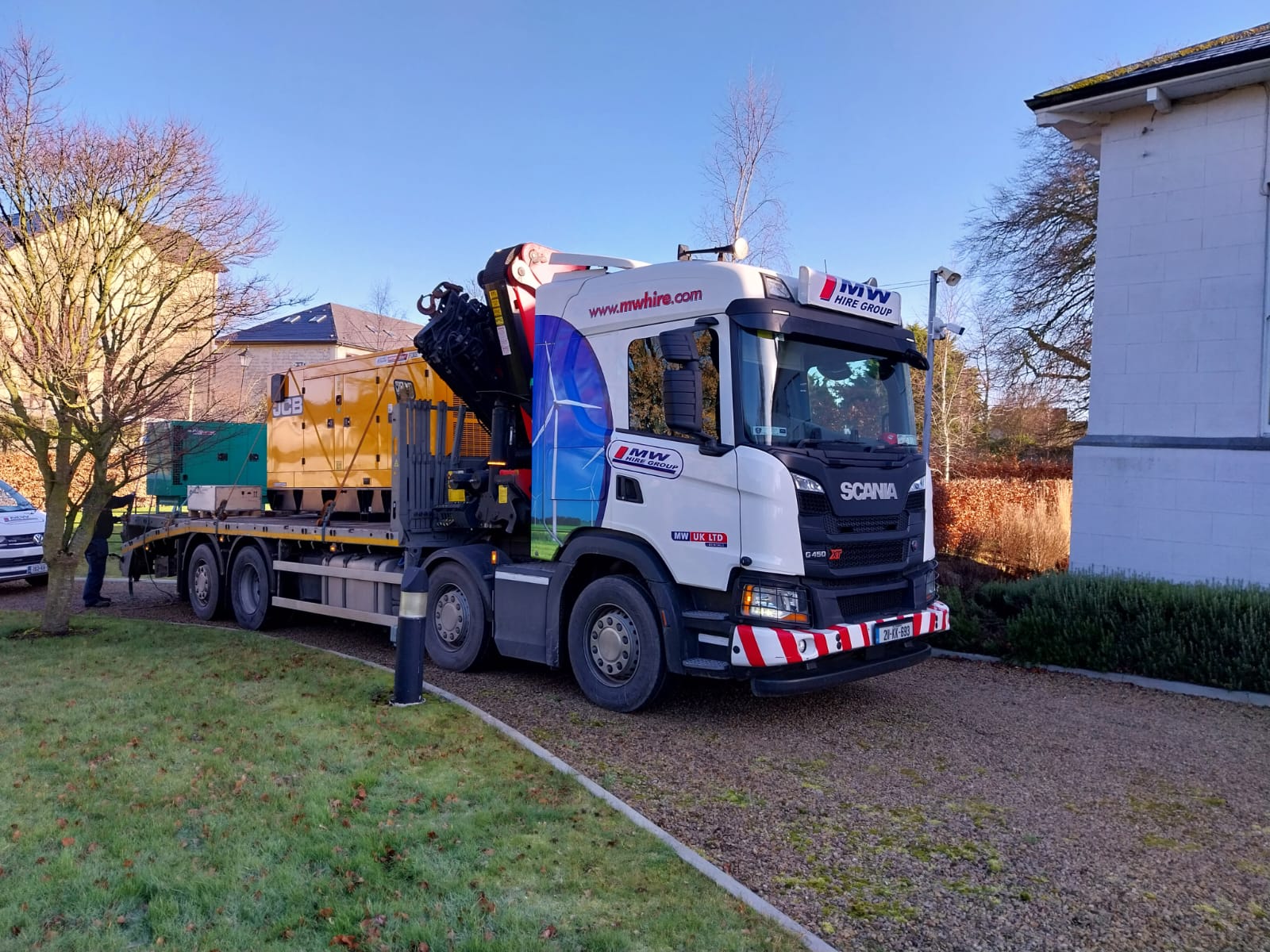 Driver and service engineer ready to drop Generators and Auto Panel to site