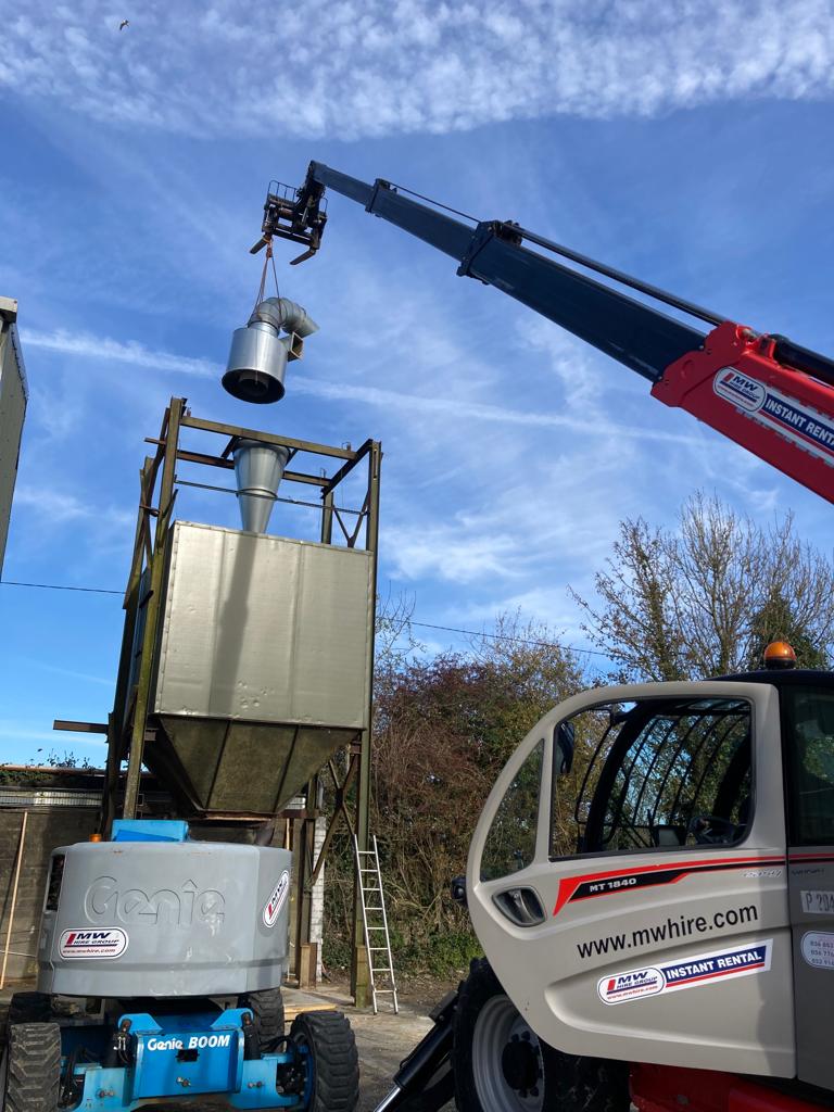 18 meter Manitou telehandler out on hire
