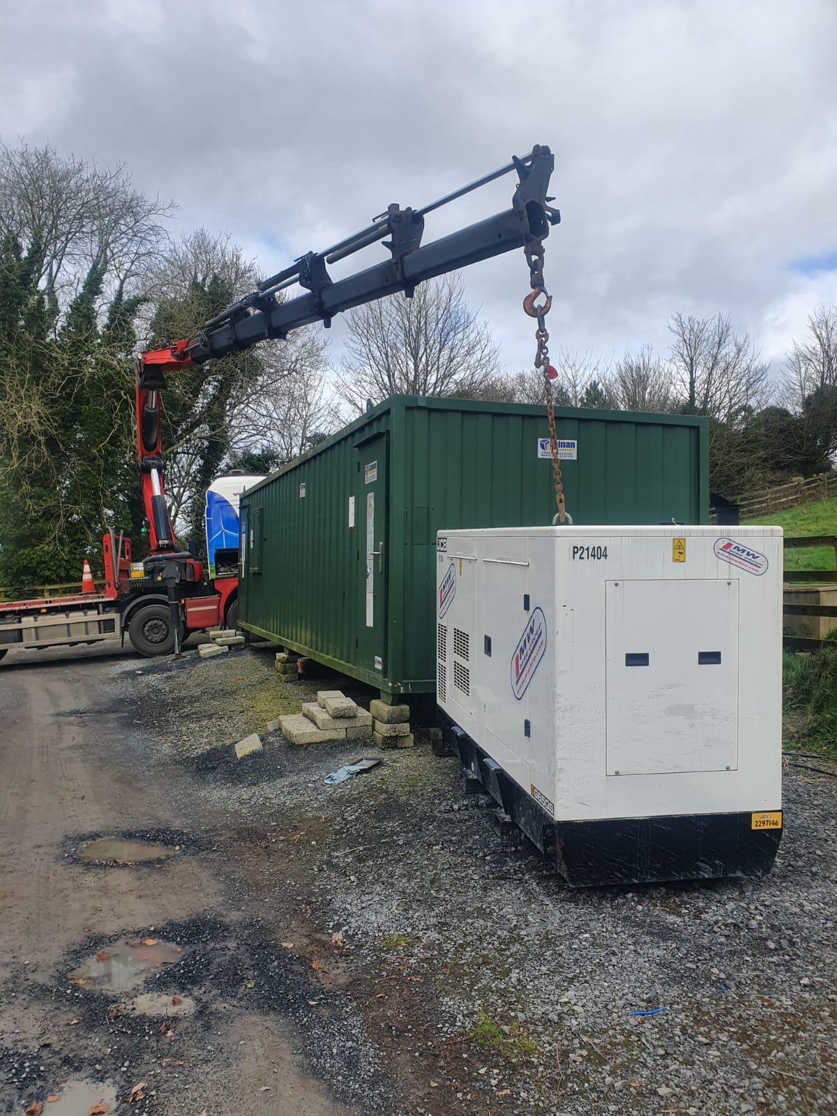 JCB G65QS Generator being crane dropped on site by one of our drivers