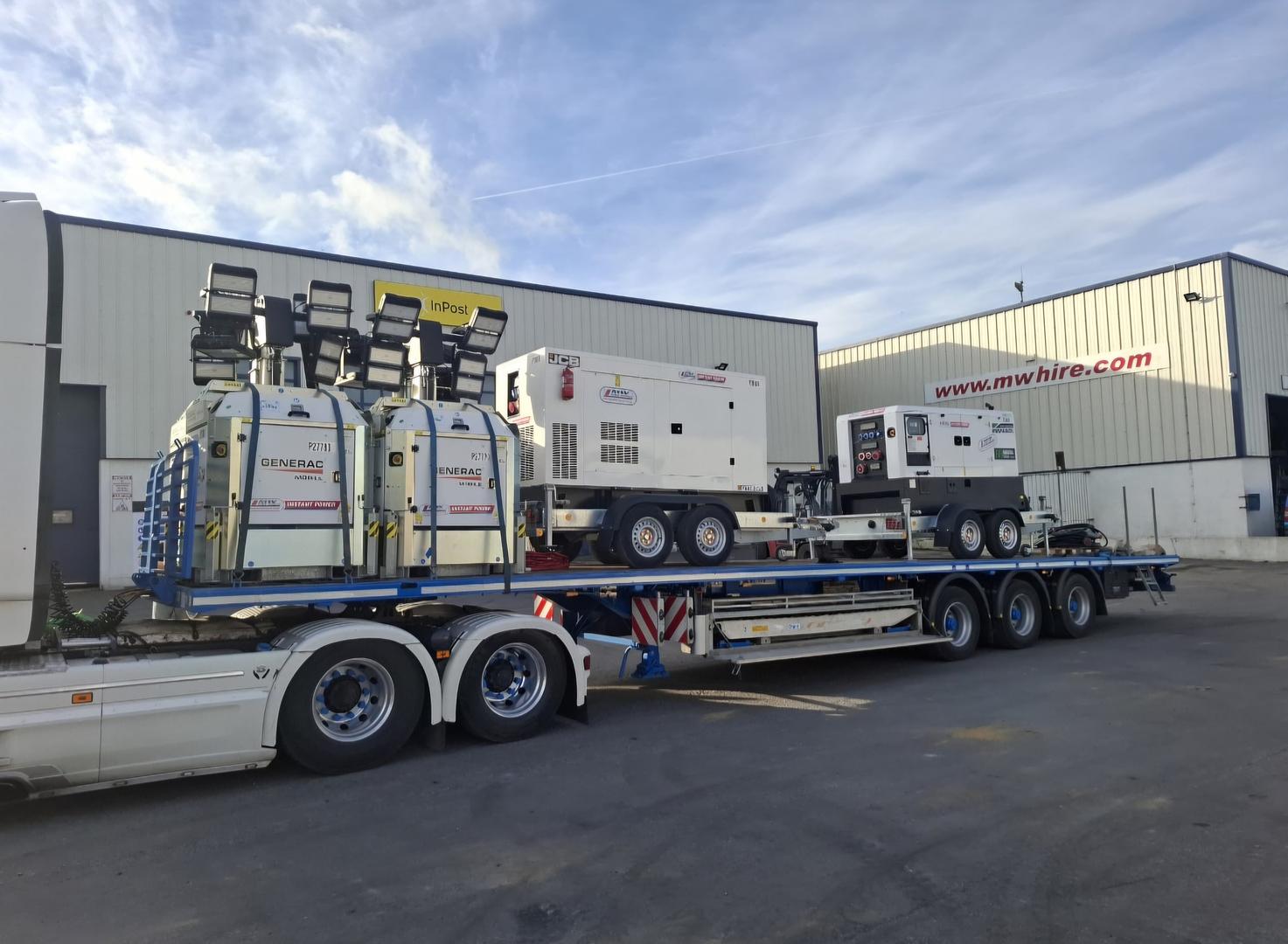 Load of towable Generators & cube lighting towers heading away on a long term rental project