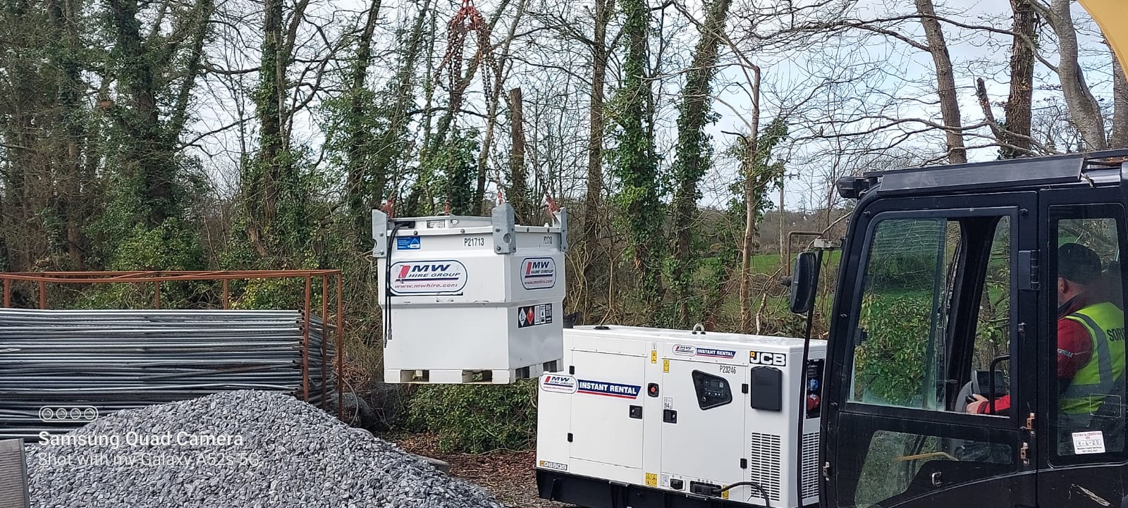 Fuel tank being positioned beside Generator on site