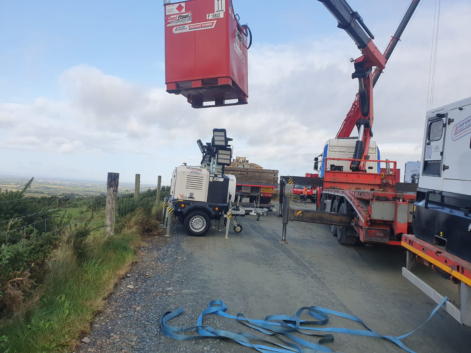 Lighting towers, Fuel tank and Generator being delivered to a Windfarm 