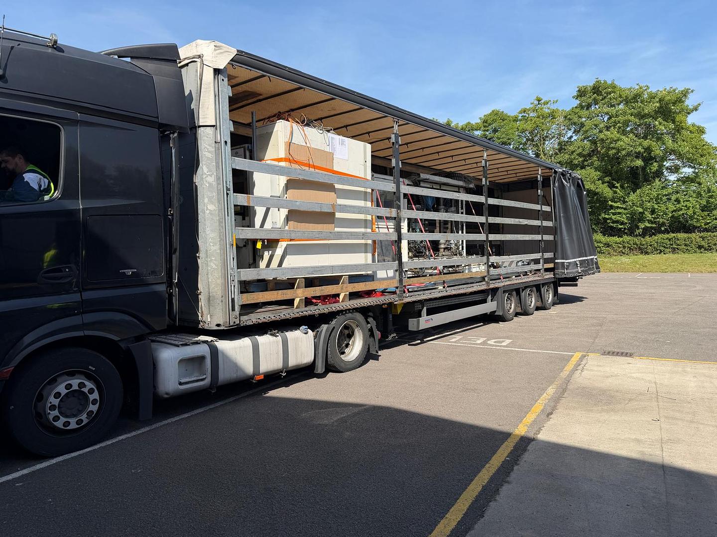 Loading in the hot sunshine