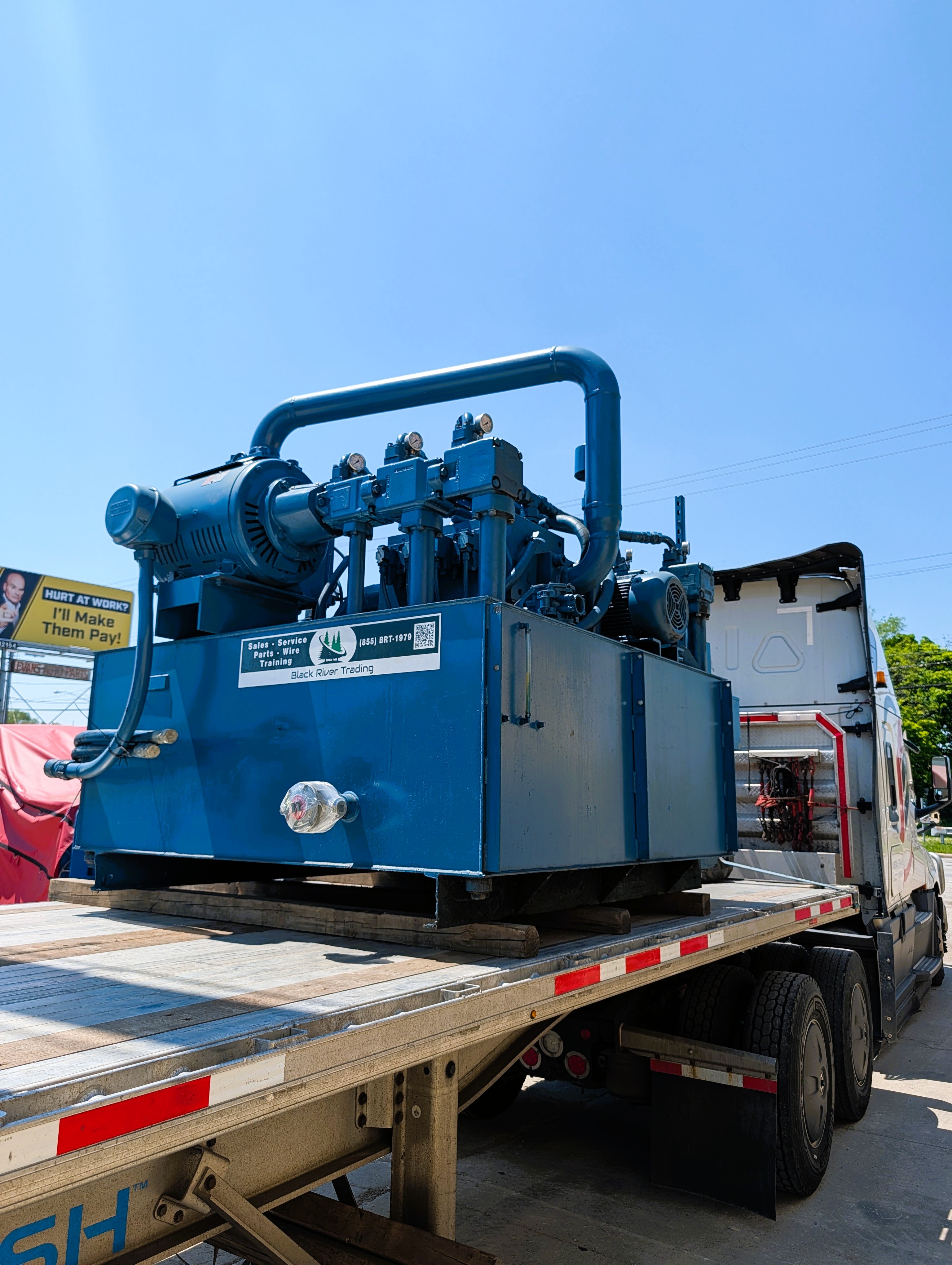 BRT Reconditioned Two-Ram Baler Loaded Out and Headed South for Installation