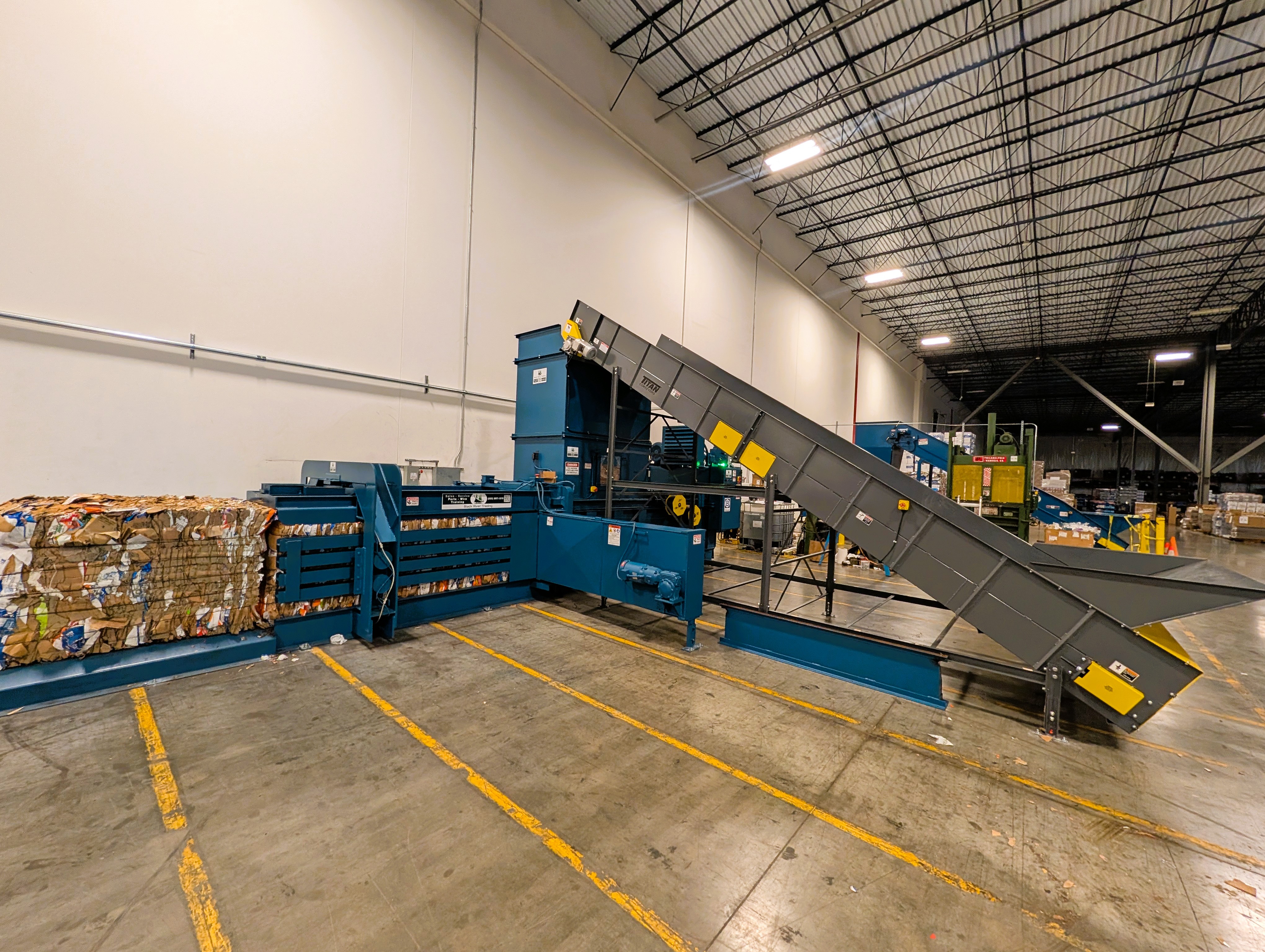 Another Balemaster Back to Work: BRT Reconditioned EO-2520 Auto-Tie Baler Installed With New Titan Conveyor