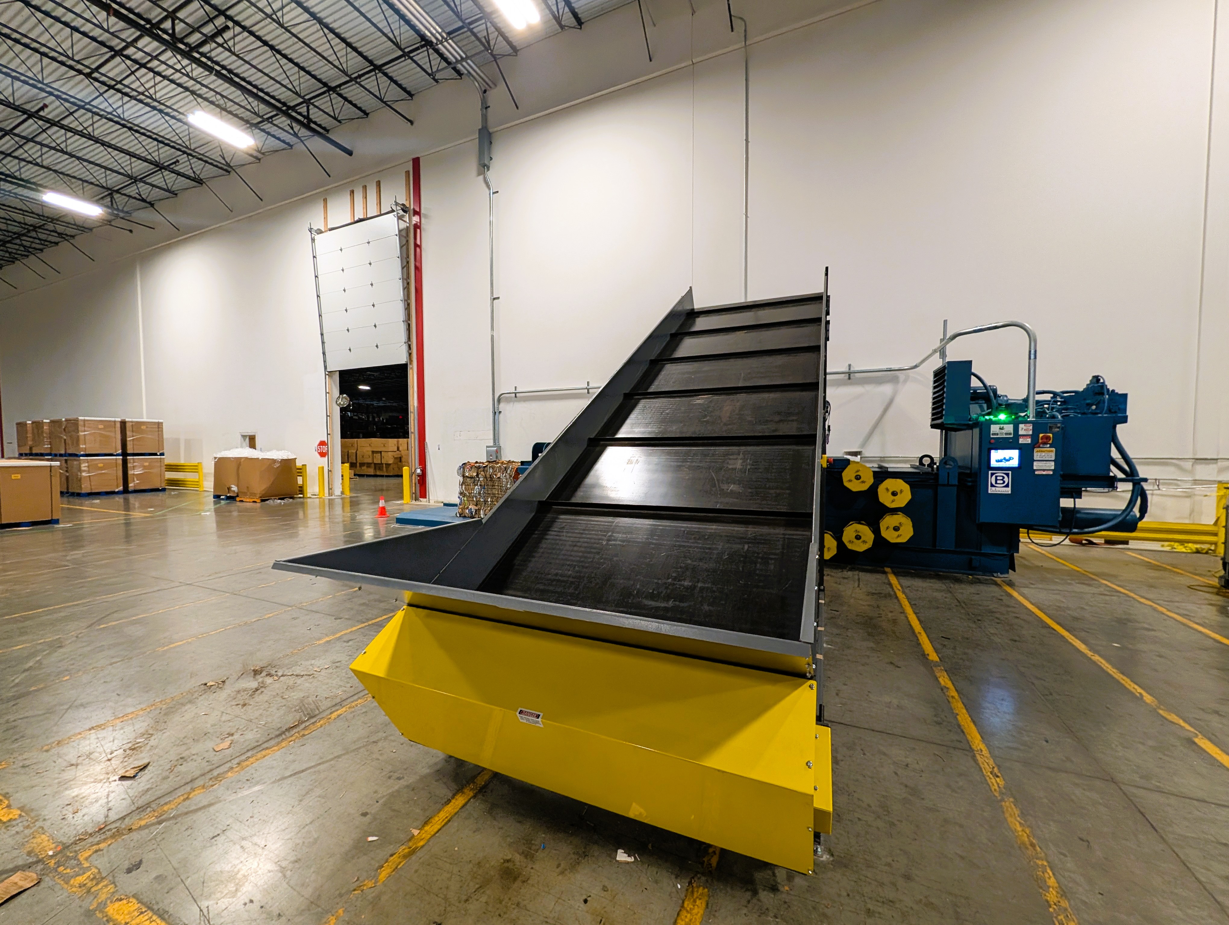 Another Balemaster Back to Work: BRT Reconditioned EO-2520 Auto-Tie Baler Installed With New Titan Conveyor