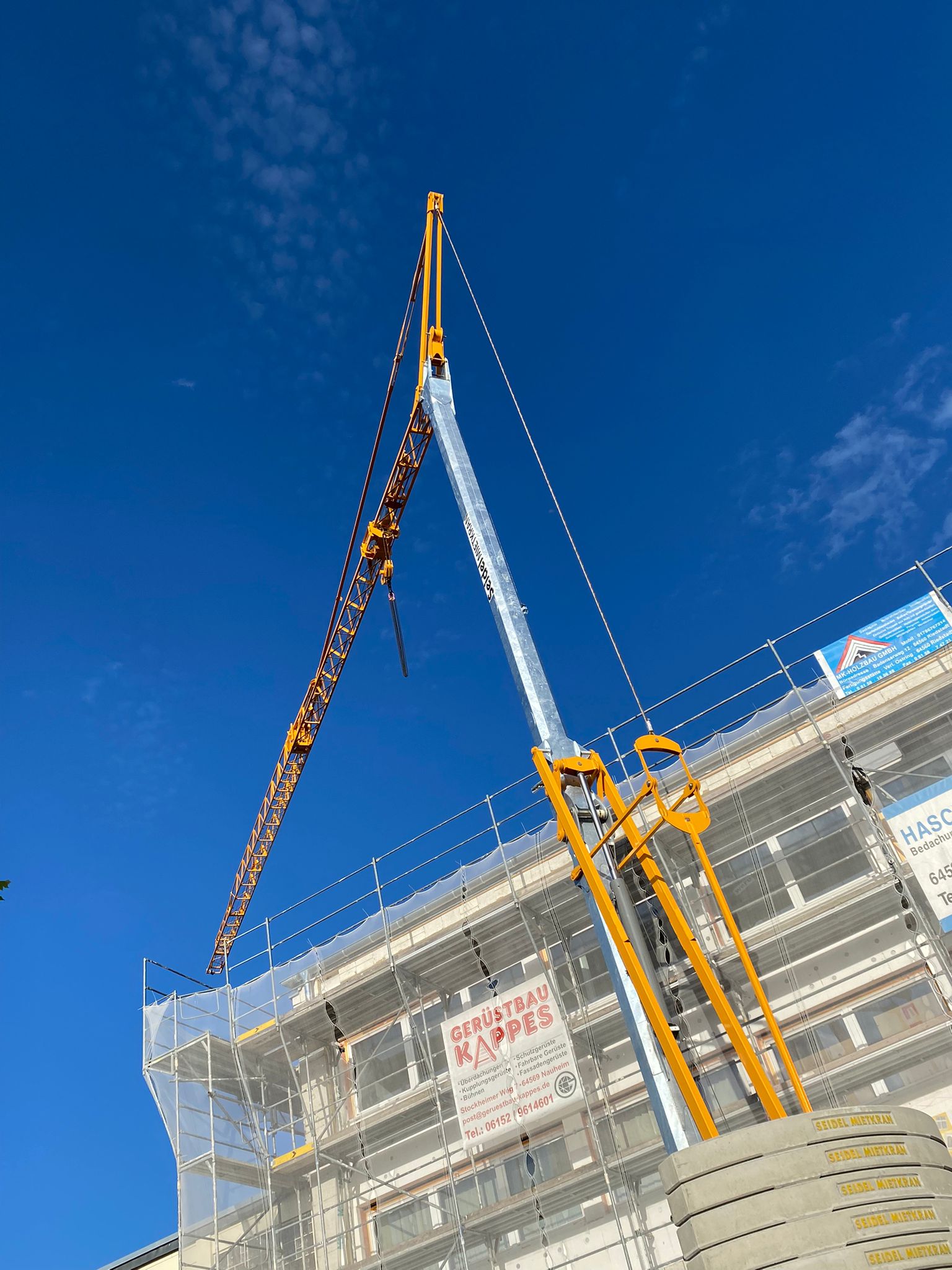 Die Ausladung des Kranes: Effizienz und Sicherheit auf der Baustelle