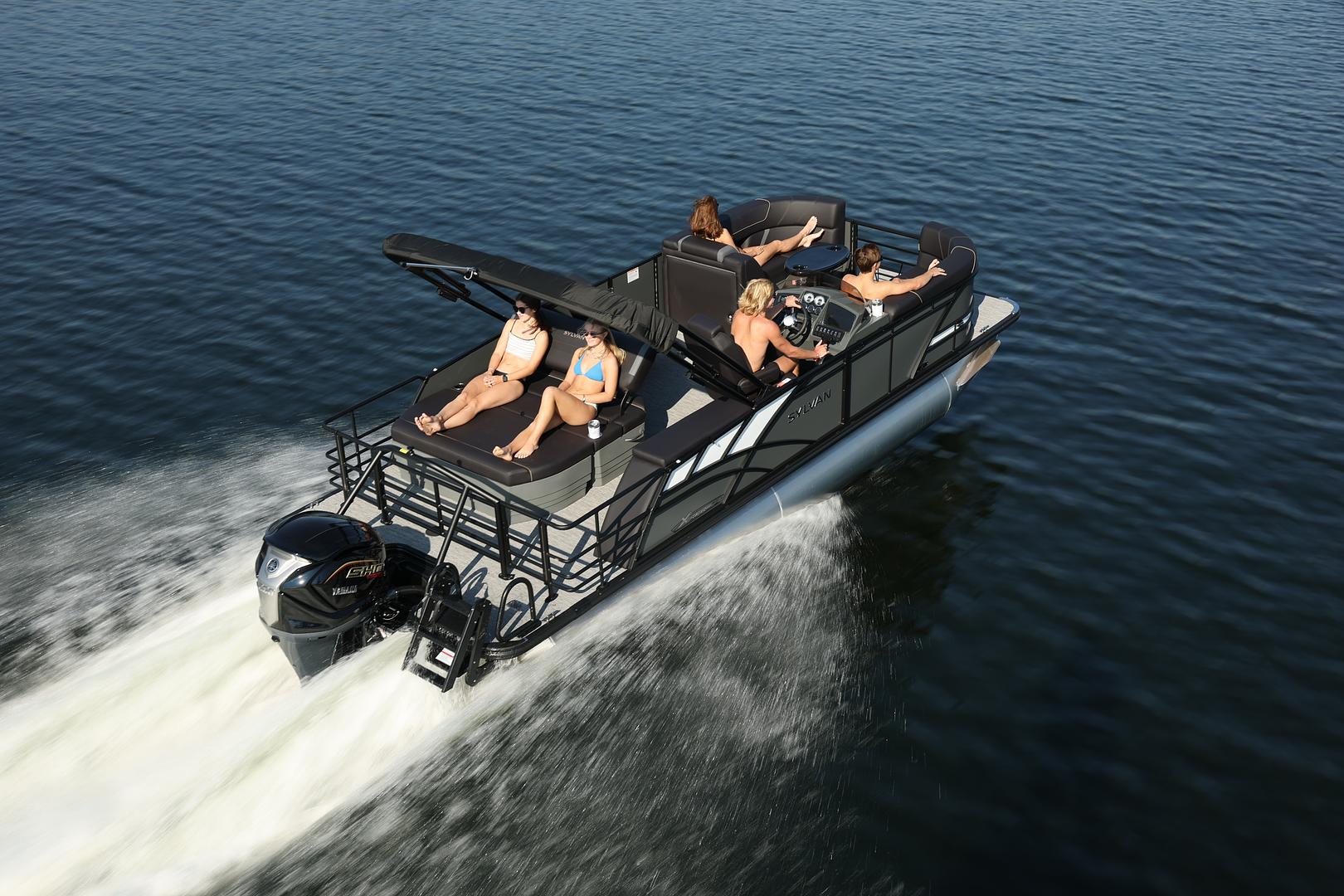 Boaters on the water near Bob Feil Boats and Motors