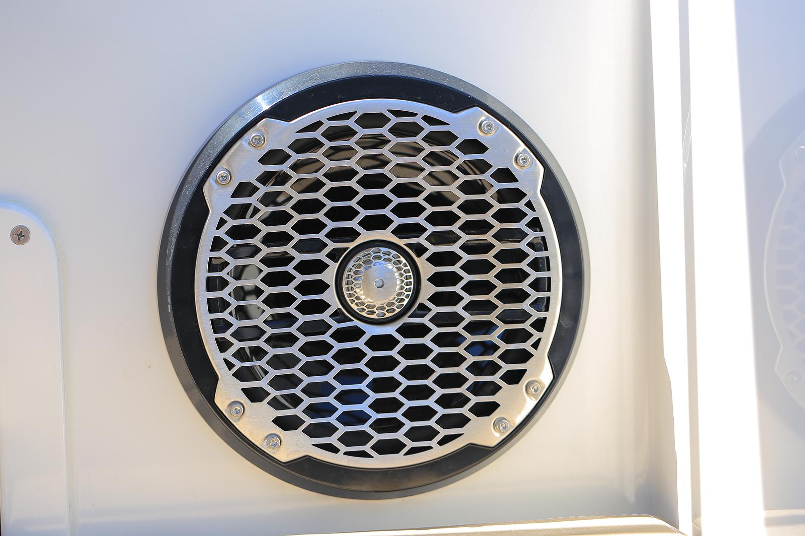 Technician installing a custom accessory on a boat or RV at Mattas Marine and RV