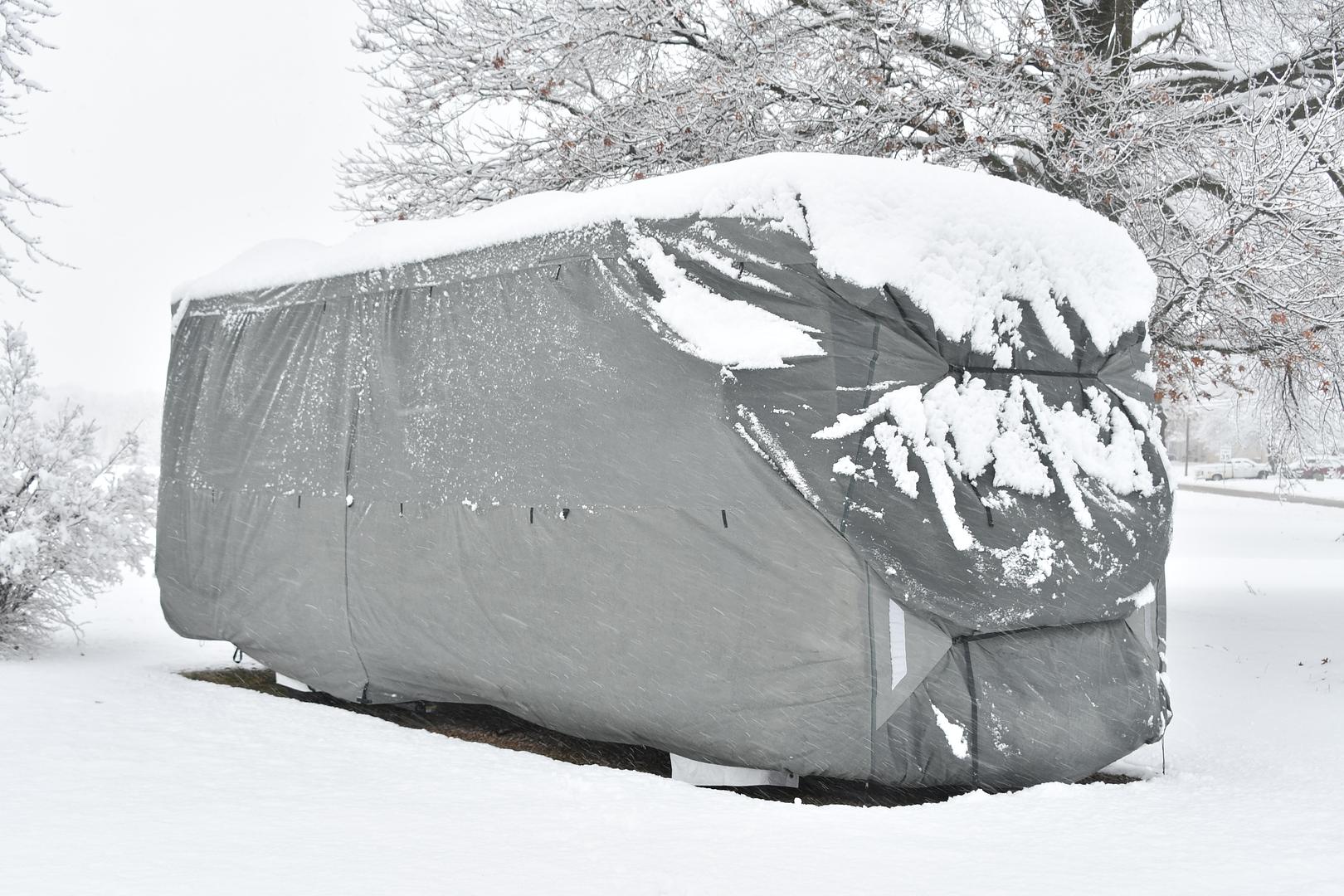 Technician winterizing a boat or RV at Mattas Marine and RV