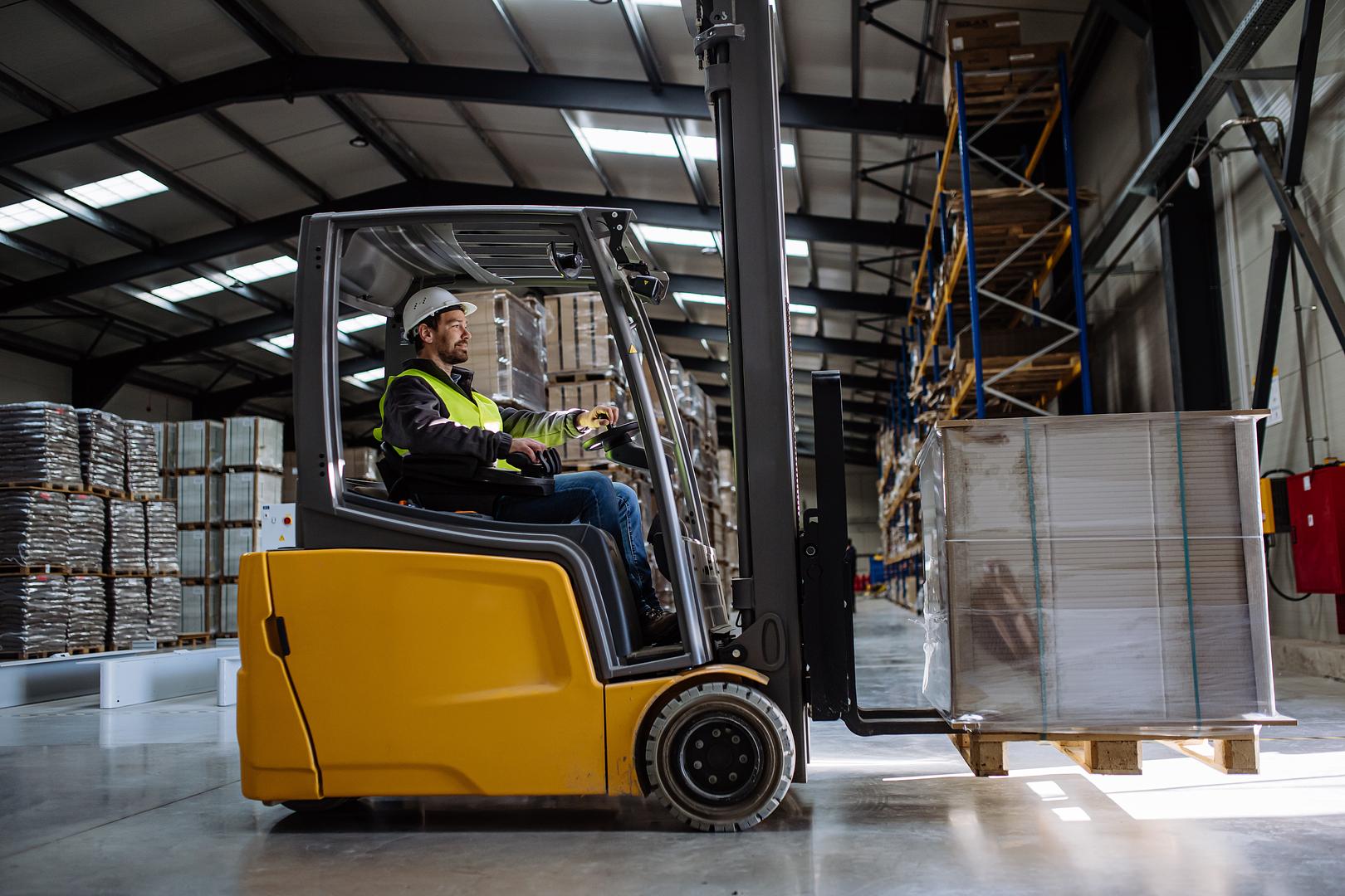 Forklift operator receiving certification training at a NovaLift Equipment on-site session