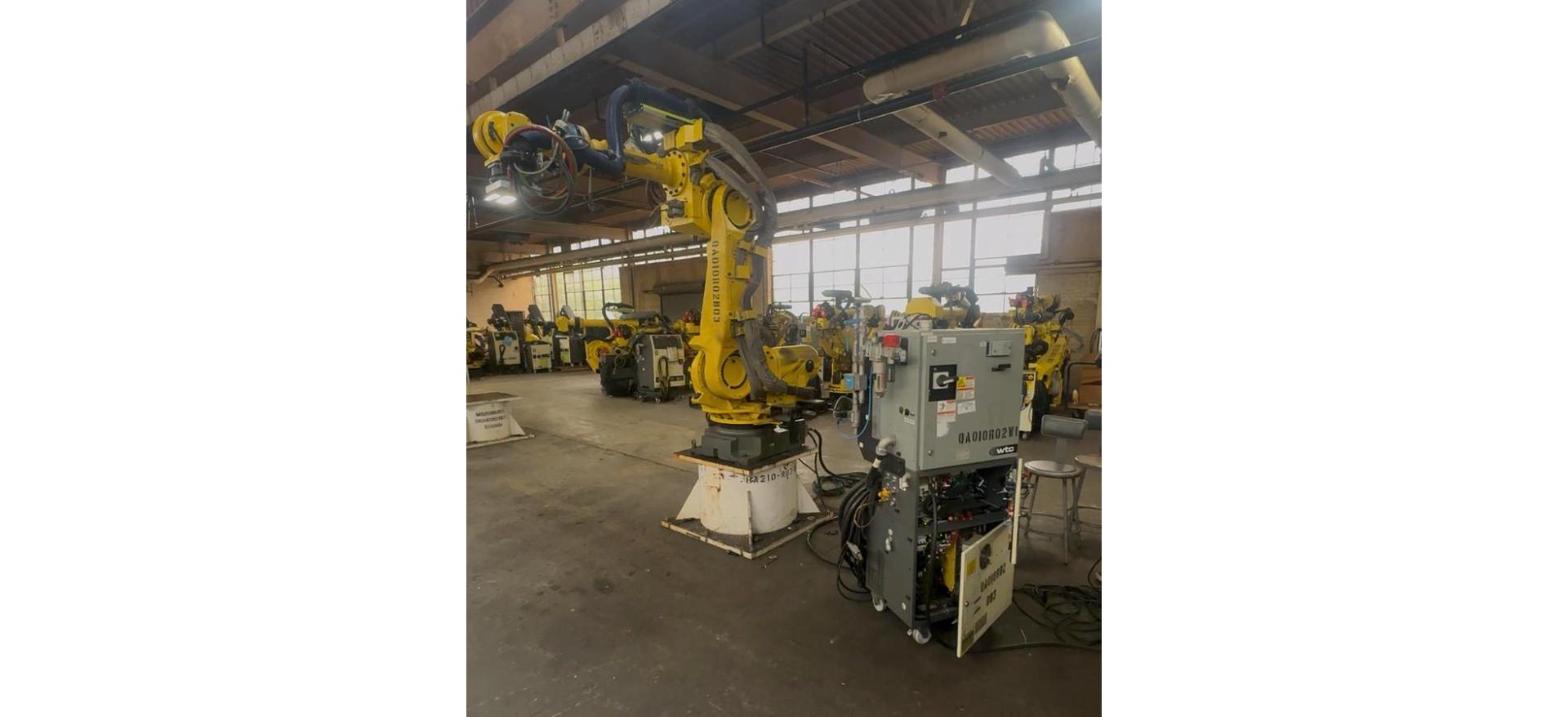 Injection Molding Robots: Using a Six Axis Arm at the Press