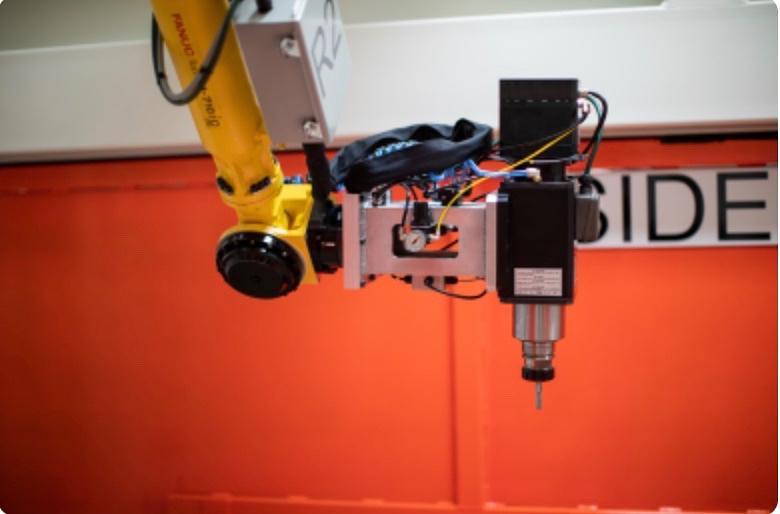 MATERIAL REMOVAL INDUSTRIAL ROBOT APPLICATION