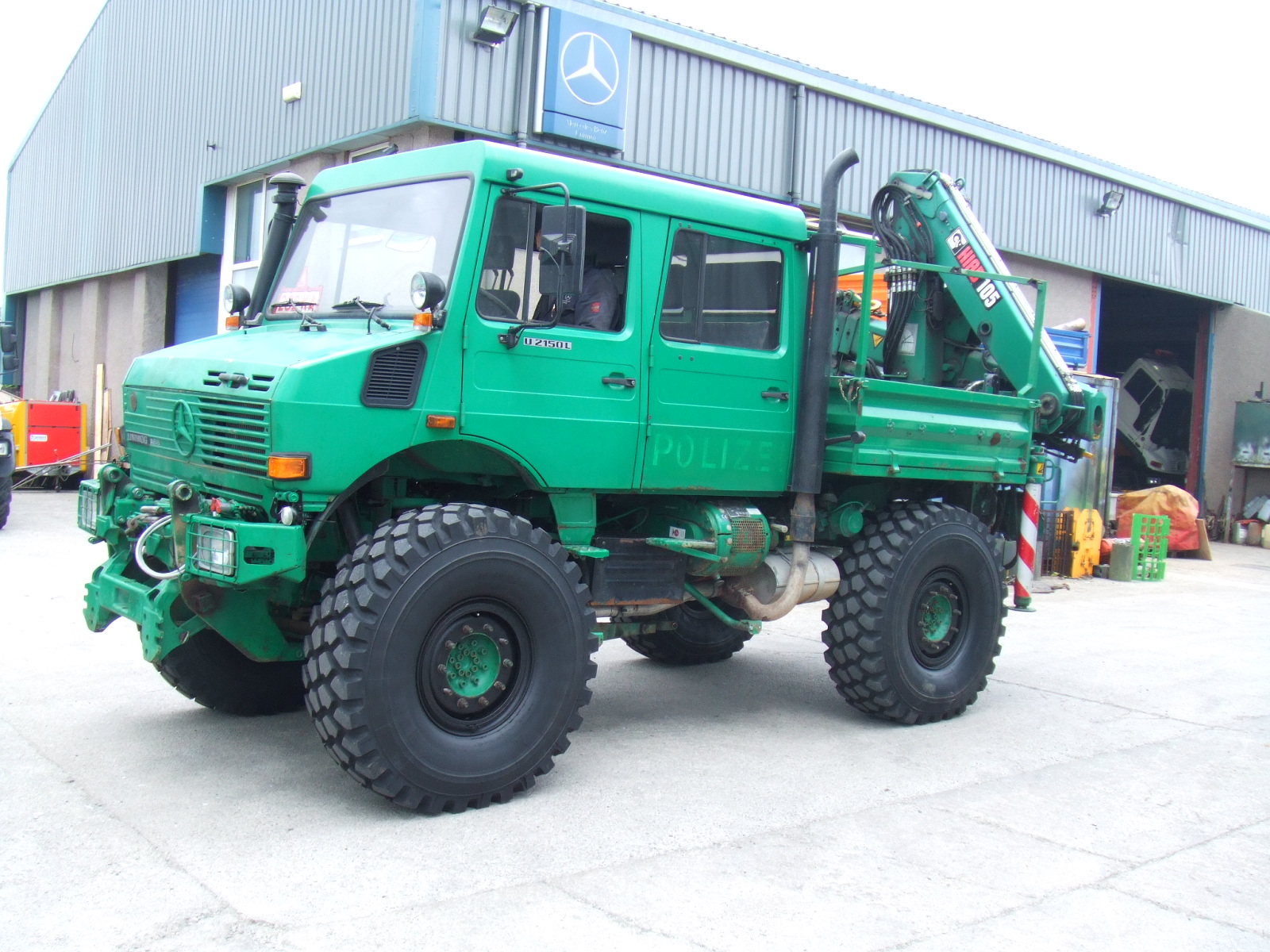 U2150L38 UNIMOG COMPLETE WITH FRONT LOADER ON ITS WAY TO CANADA